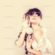 depositphotos_18309359-Fashion-portrait-of-a-beautiful-young-sexy-woman-wearing-sunglasses-